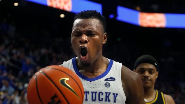 Kentucky  s Oscar Tshiebwe celebrates a ta slam dunk against Missouri.Dec. 29. 2021

Kentuckymisouri 14